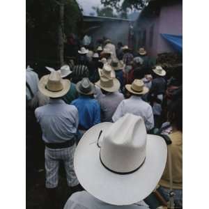  A Gathering of Guatemalan Men in Cowboy Style Hats 