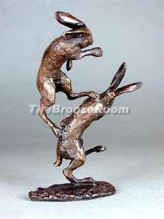 SOLID BRONZE FIGHTING HARES BY PAUL JENKINS  