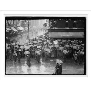   (May Day) parade, crowd in rain in street, New York