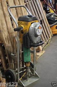 WACKER GAS POWERED JACK HAMMER WITH BITS AND DOLLEY  