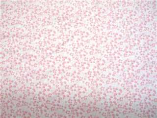 New Paddington Bear Fabric BTY Paw Prints Pink  