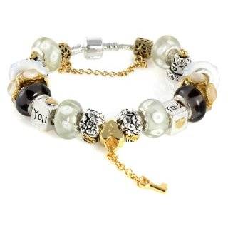 Charm Bracelet Has 17 Beads: Beautiful Charms, Murano Beads. Pandora 