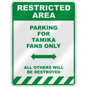   PARKING FOR TAMIKA FANS ONLY  PARKING SIGN