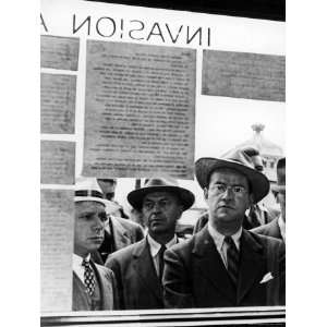  Businessmen Stopping to Read Notice Proclaiming the D Day 