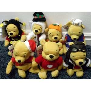 Set of 7 Dolls Including Nautical SS Pooh Shipmate, Frosty the Snowman 