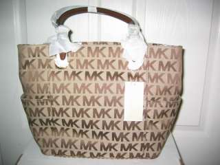   is a Brand New with Tag Authentic MICHAEL KORS SIGNATURE TOTE HANDBAG