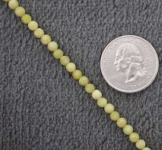 Description One Strand of South China Jade Stone Beads .